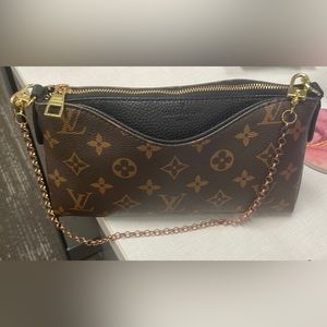 First C-O-P-Y LV purse